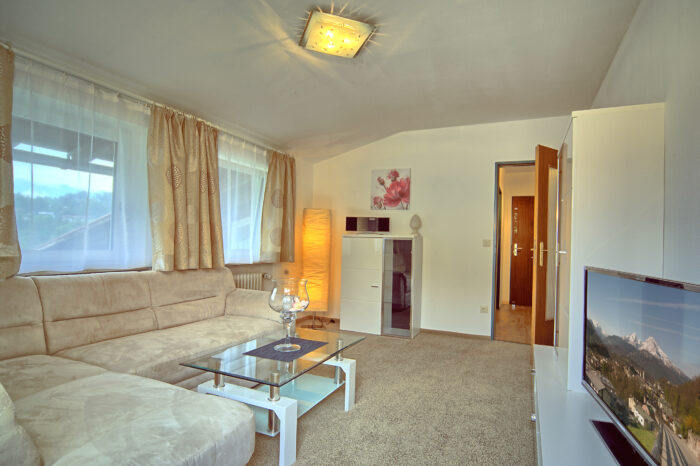 Bildergalerie 28 Alpenhotel Fischer, Ferienwohnung Almrausch, Wohnzimmer 1